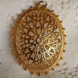 VTG gold tone Pendant Awith Intricate design